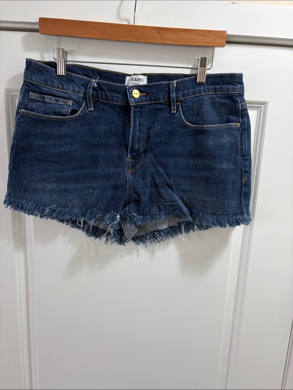 Excellent condition sz 32 Frame Denim Dark Blue Frayed Hem Jean Shorts